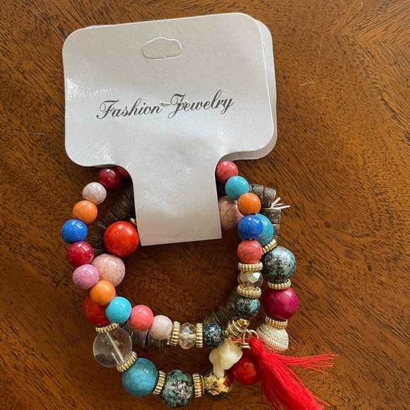 Stackable bracelets with cute little elephants and living trees. - Picture 2 of 6